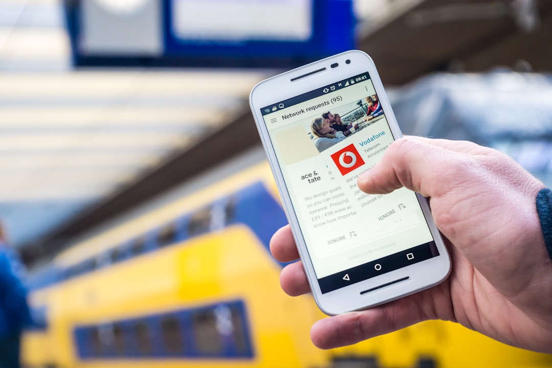 person-holding-white-samsung-android-smartphone-2-p0ygpwffs